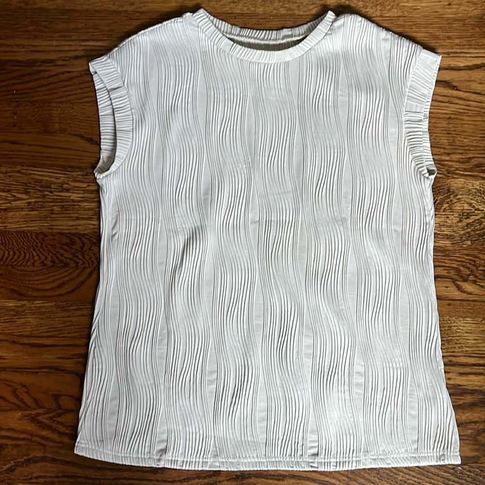 Cap sleeved top, light creamy beige color, size Large